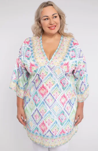 Värviline poncho toonis pontšo