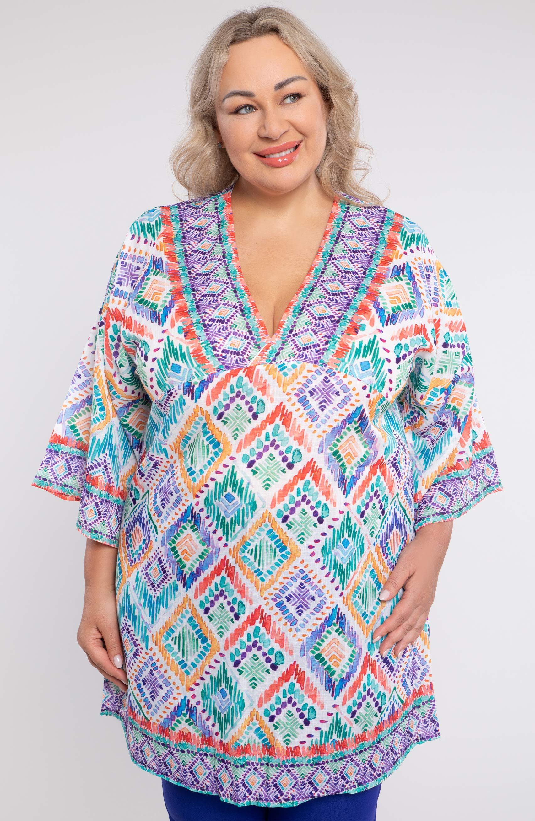 Värviline poncho rohelises toonis
